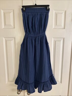 Woman’s navy and slate ruffle bottom peasant dress strapless